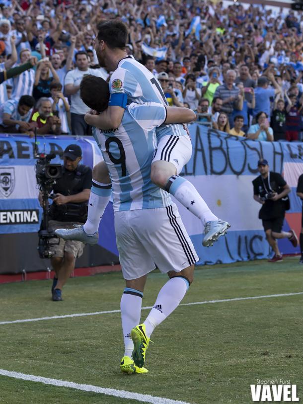 Argentina forward Lionel Messi (10) jumps on Argentina forward Gonzalo Higuain (9) after he scored the first goal of the Copa America Centenario 2016 quarter-final match between Argentina and Venezuela at Gillette Stadium in Foxboro, MA.