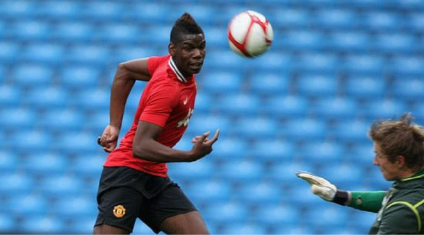 Pogba in his early days in a United shirt | Photo: Getty