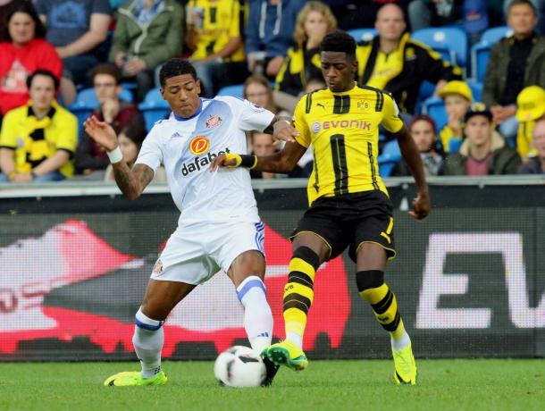 Above: Patrick Van Aanholt going in for the tackle in Sunderland's 1-1 draw with Borussia Dortmund | Photo: safc.com