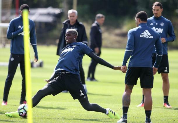 Pogba gets stuck in at training with his new teammates | Photo: Getty