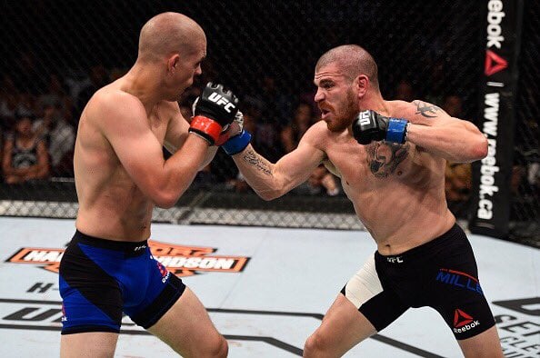 Miller's (R) win means he is now tied for the most victories in UFC LW history | Photo: UFC