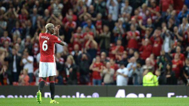 Pogba applauds the Old Trafford crowd at the full whistle | Photo: Getty