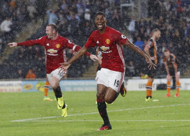 Rooney celebrates with Rashford after his late winner against Hull | Photo: Getty