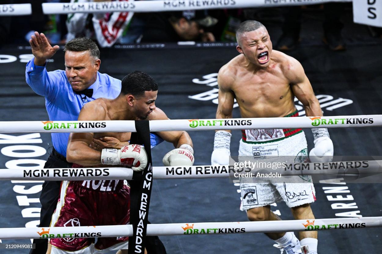 LAS VEGAS, NV - MARCH 30: Isaac Cruz ''Pitbull'' (in white short) knocked Rolando Romero ''Rolly'' (in burgundy short) out during their super lightweight world titles of the Premiere Boxing Championship on Saturday night at the T-Mobile Arena in Las Vegas, Nevada, United States on March 30, 2024. (Photo by Tayfun Coskun/Anadolu via Getty Images)