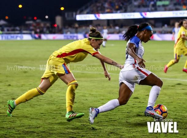 Crystal Dunn, playing with the USWNT, on the attack. | Photo: Jim Malone