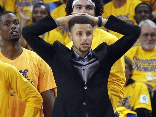 Steph Curry in his suit (Photo: Cary Edmondson, USA TODAY Sports)