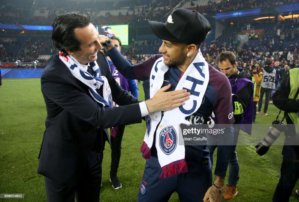 Coach of PSG Unai Emery, Neymar Jr celebrate during the French Ligue 1 Championship Trophy Ceremony following the Ligue 1 match between Paris Saint-Germain (PSG) and Stade Rennais (Rennes) at Parc des Princes stadium on May 12, 2018 in Paris, France. (Photo by Jean Catuffe/Getty Images)
