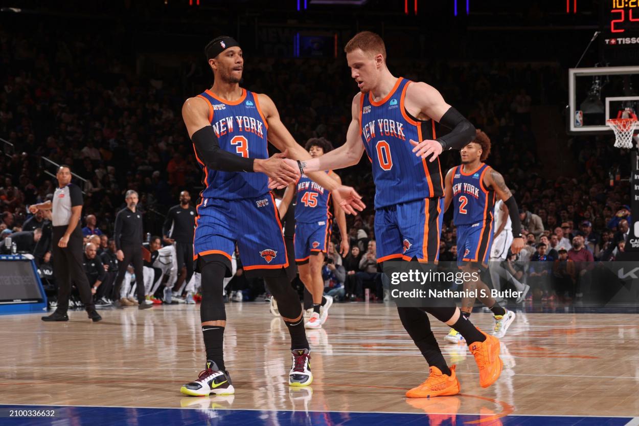 Josh Hart #3 and Donte Divincenzo #0 of the New York Knicks high five during the game against the Brooklyn Nets on March 23, 2024 at Madison Square Garden in New York City, New York. NOTE TO USER: User expressly acknowledges and agrees that, by downloading and or using this photograph, User is consenting to the terms and conditions of the Getty Images License Agreement. Mandatory Copyright Notice: Copyright 2024 NBAE (Photo by Nathaniel S. Butler/NBAE via Getty Images)