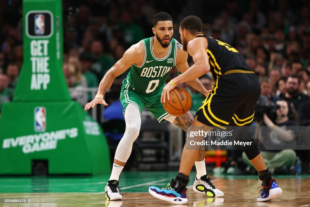 Jayson Tatum #0 of the Boston Celtics defends Stephen Curry #30 of the Golden State Warriors during the second quarter at TD Garden on March 03, 2024 in Boston, Massachusetts. NOTE TO USER: User expressly acknowledges and agrees that, by downloading and or using this photograph, user is consenting to the terms and conditions of the Getty Images License Agreement. (Photo by Maddie Meyer/Getty Images)