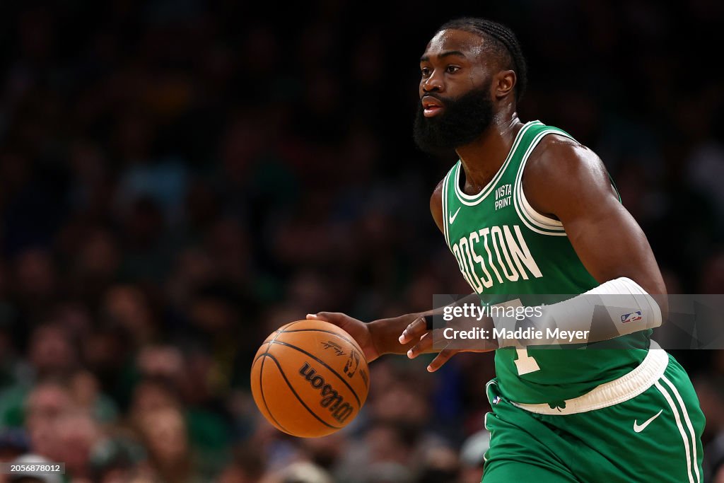 Jaylen Brown #7 of the Boston Celtics dribbles against the Golden State Warriors during the first quarter at TD Garden on March 03, 2024 in Boston, Massachusetts. NOTE TO USER: User expressly acknowledges and agrees that, by downloading and or using this photograph, user is consenting to the terms and conditions of the Getty Images License Agreement. (Photo by Maddie Meyer/Getty Images)