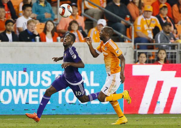 DaMarcus Beasley (in orange, right). Photo credits: Scott Halleran / Getty Images North America 