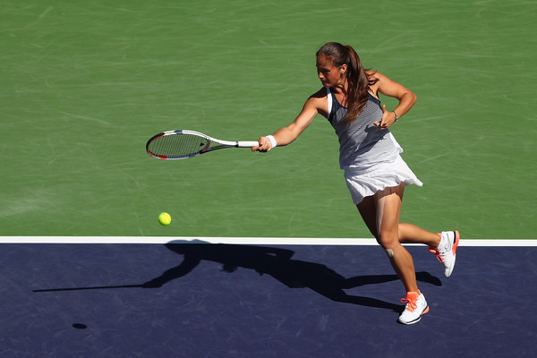 Kasatkina strikes a forehand. Photo: Julian Finney/Getty Images