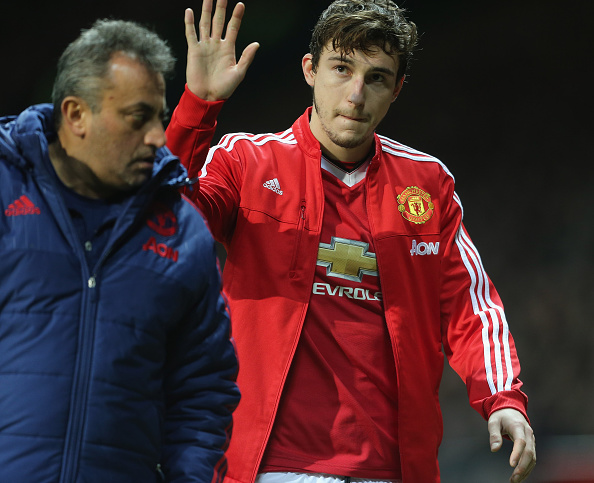 Matteo Darmian walks off injured | Photo: Tom Purslow/Manchester United