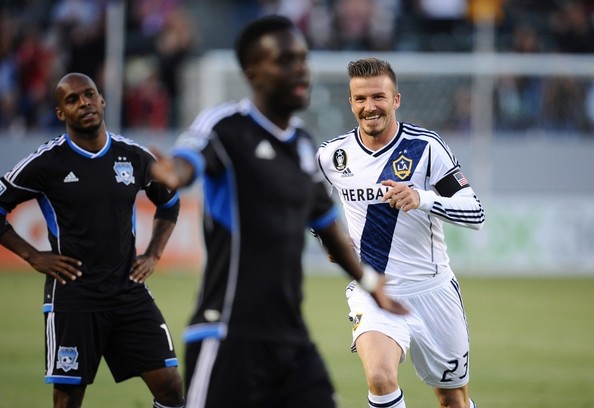 David Beckham (Back) celebrating a victory over the Quakes in his days with the Galaxy. Photo provided by Bauer Griffin.