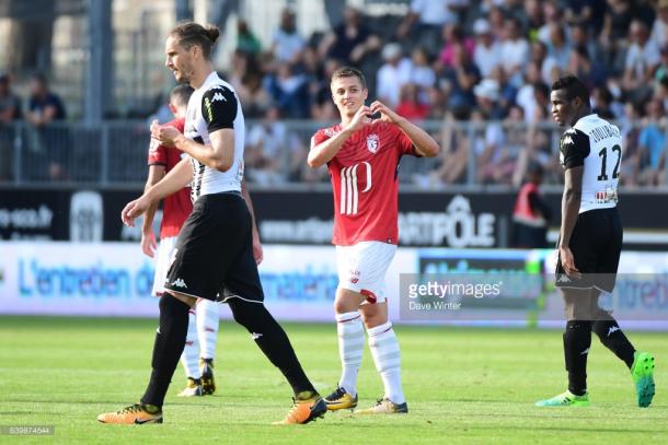 De Préville celebrates a brilliant goal against Angers. Source | Getty Images.