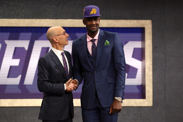 Deandre Ayton poses with Commissioner Adam Silver after being drafted first overall by the Phoenix Suns. |Source: Mike Stobe/Getty Images North America|