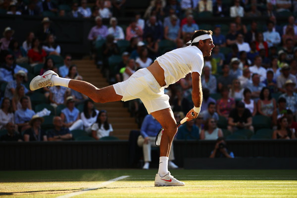 Juan Martin del Potro serves to Rafael Nadal on Centre Court at Wimbledon. Photo: Clive Brunskill/Getty Images
