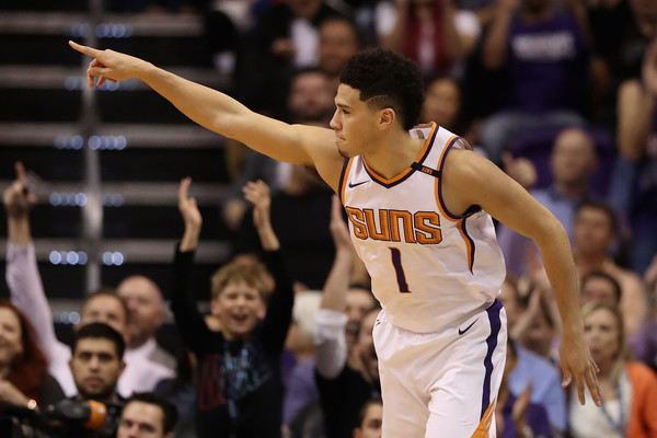 Devin Booker #1 of the Phoenix Suns reacts after hitting a three point shot against the Los Angeles Lakers. |Nov. 12, 2017 - Source: Christian Petersen/Getty Images North America|