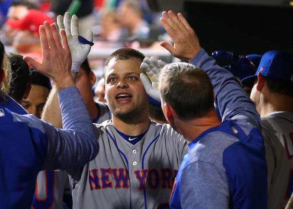 Mesoraco receives congratulations in the New York dugout after his ninth-inning home run/Photo: RIch Schultz/Getty Images