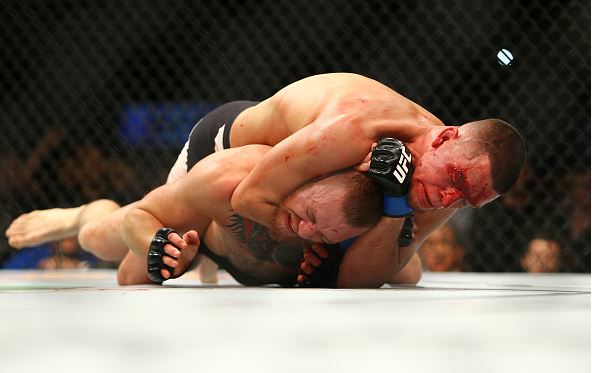 Nate Diaz applies a choke hold to win by submission against Conor McGregor during UFC 196 at the MGM Grand Garden Arena on March 5, 2016 in Las Vegas, Nevada. (Photo by Rey Del Rio/Getty Images