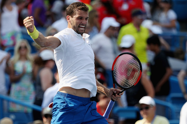 Dimitrov reacts to clinching his place in the final. Photo: Rob Carr/Getty Images