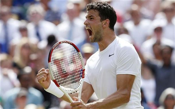 Dimitrov celebrates his win over Murray at Wimbledon in 2014. Photo: PA