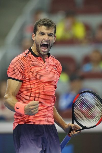 Dimitrov celebrates an upset win over Lucas Pouille during his run in Beijing. Photo: Emmanuel Wong/Getty Images