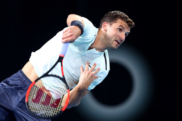 Grigor Dimitrov serves in his quarterfinal win. Photo: Chris Hyde/Getty Images