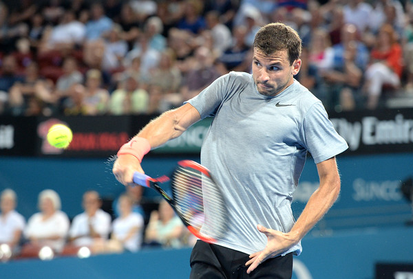 Grigor Dimitrov tees off on a backhand on Monday in Brisbane. Photo: Bradley Kanaris/Getty Images