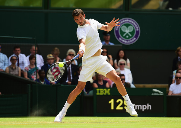 Dimitrov hits a forehand at Wimbledon in 2015. Photo: Shaun Botterill/Getty Images