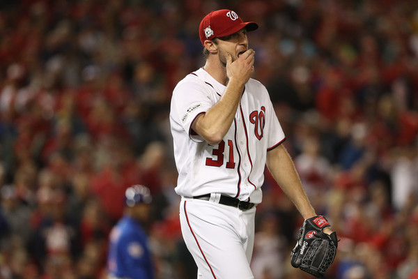 Max Scherzer #31 of the Washington Nationals reacts after giving up a two run double to Addison Russell #27 of the Chicago Cubs. |Oct. 11, 2017 - Source: Patrick Smith/Getty Images North America|