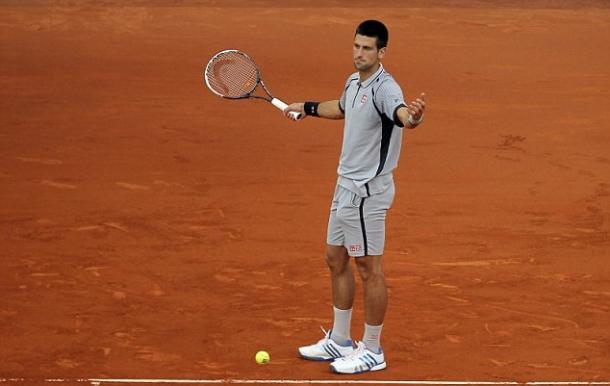 Novak Djokovic shows his frustration during his 2013 loss in Madrid. Photo: AP