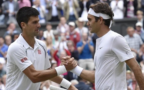 Djokovic shakes hands with Roger Federer after the 2015 Wimbledon final. Photo: AP