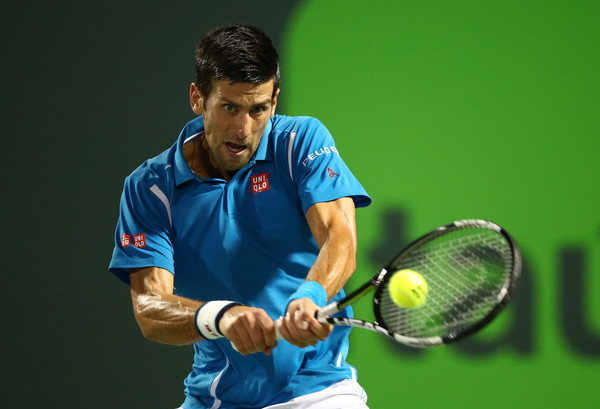 Novak Djokovic strikes a backhand during his second round match. Photo: Clive Brunskill/Getty Images