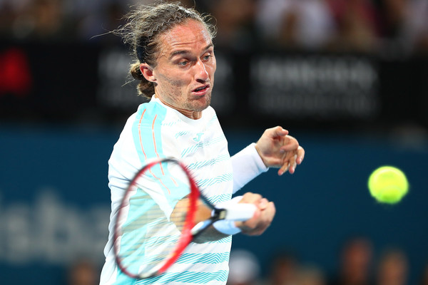 Alexandr Dolgopolov hits a forehand during his first round loss. Photo: Chris Hyde/Getty Images