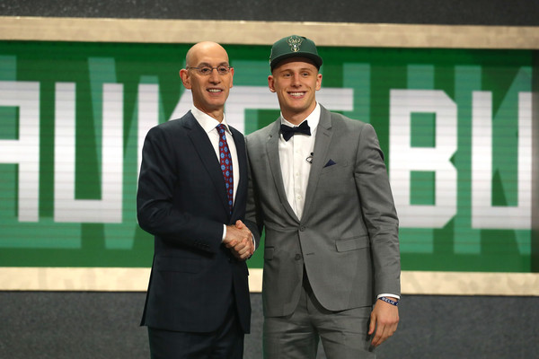 Donte DiVincenzo poses with NBA Commissioner Adam Silver |Mike Stobe/Getty Images North America|