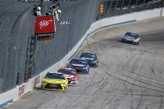 Kenseth takes the checkered flag last year. (Sean Gardner/Getty Images)