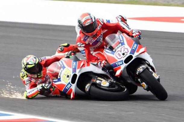 Oh no! Iannone crashes into his team-mate | Photo: AFP