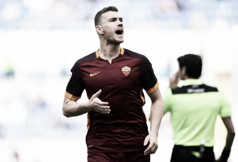 Above: Substitute Edin Dzeko scores Roma's second in a 4-1 win over rivals Lazio | BBC Sport 