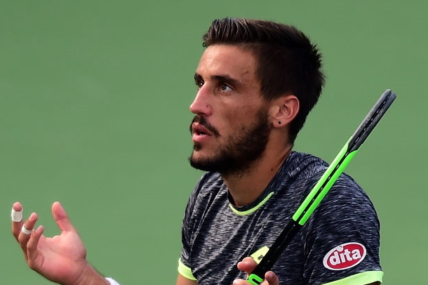 Photo: Jared C. Tilton/Getty Images- Damir Dzumhur expresses his frustration early.