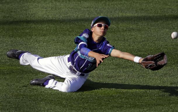 Gabriele Persici makes a catch. (AP Photo/Gene J. Puskar)