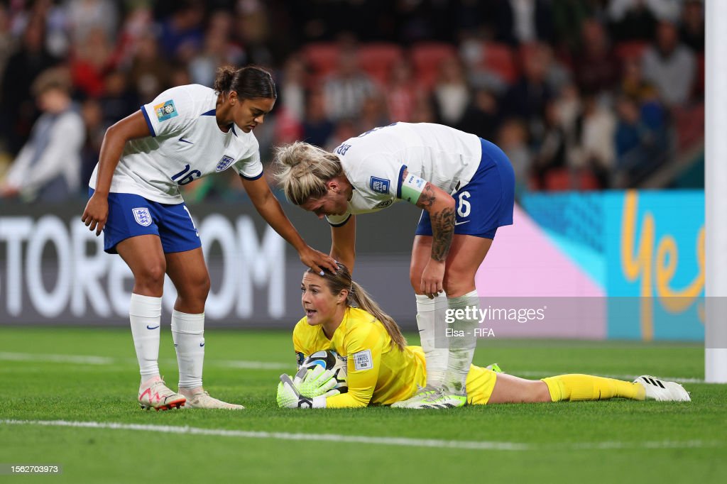 Mary Earps of England (C) reacts with teammates Jessica Carter and Millie Bright after making a save during the FIFA Women's World Cup Australia & New Zealand 2023 Group D match between England and Haiti at Brisbane Stadium on July 22, 2023 in Brisbane / Meaanjin, Australia. (Photo by Elsa - FIFA/FIFA via Getty Images)