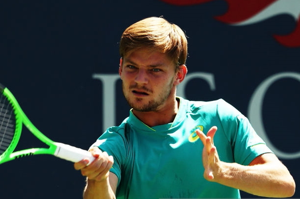 Photo: Elsa/Getty Images- David Goffin hits a forehand winner