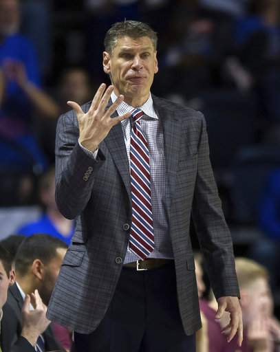 Loyola head coach Porter Moser sginals to his team during the Rambler