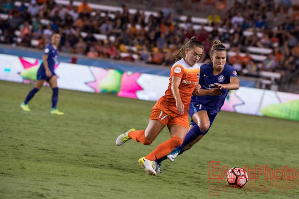 Houston Dash and Brazilian midfielder, Andressinha, battling with Orlando Pride and Austraalian defeneder, Steph Catley. l Photo: EarchPhoto