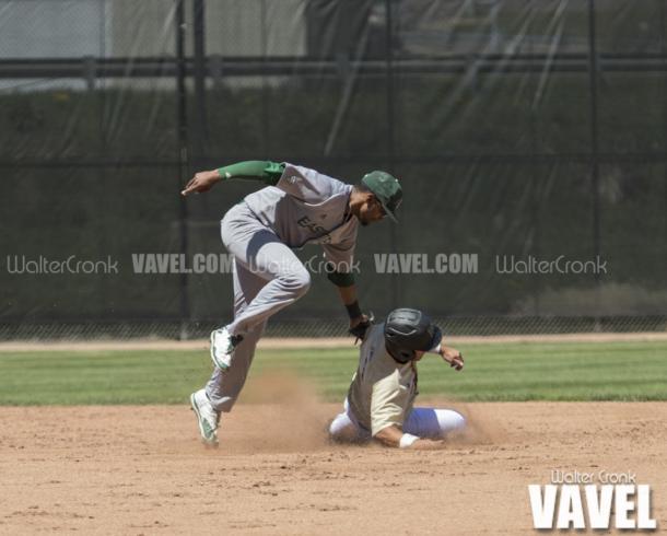 Grant Miller (1) gets thrown out trying to steal 2nd base. Photo: Walter Cronk