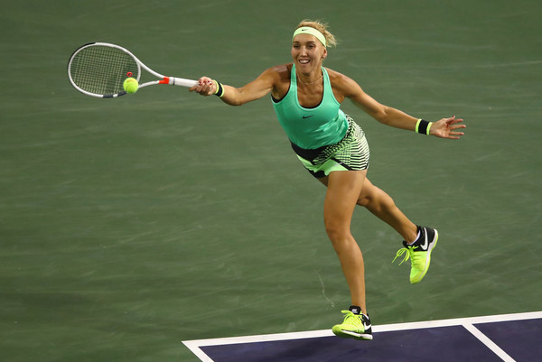 Elena Vesnina lunges to hit a forehand return during her straight-sets victory over Kristina Mladenovic in the semifinals of the 2017 BNP Paribas Open. | Photo: Clive Brunskill/Getty Images