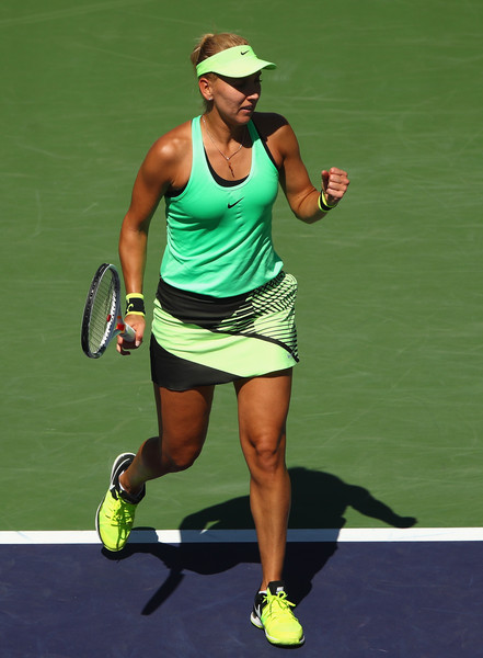 Elena Vesnina celebrates winning a point during the final against Kuznetsova | Photo: Clive Brunskill/Getty Images North America