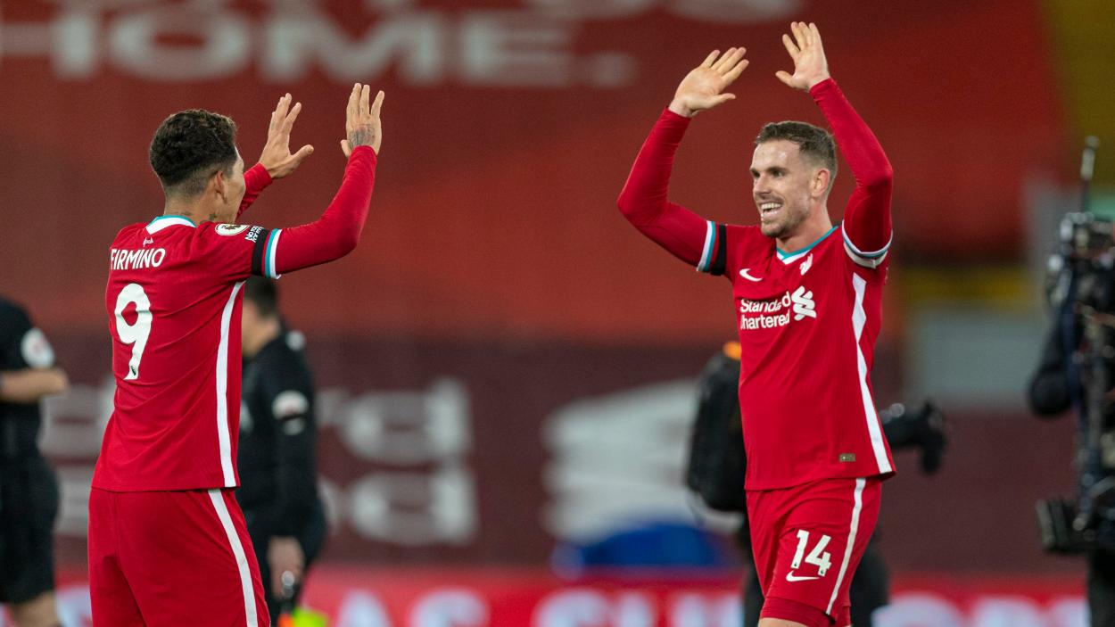El capitán Jordan Henderson y el héroe Roberto Firmino celebran una importante victoria / Foto: Liverpool FC