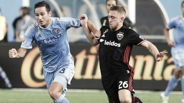Lampard and Vincent battle for the ball | Source: mlssoccer.com